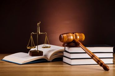 Legal gavel on law books.